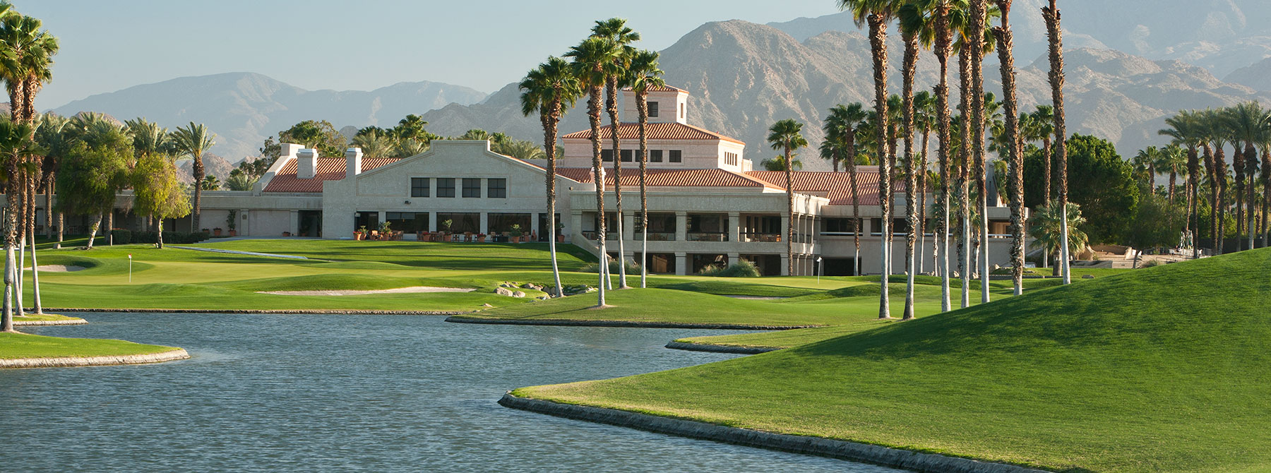 View of club with lake in foreground 